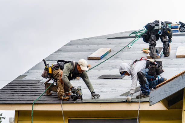 Professional Gutter Installation technician working in Inverness, CA